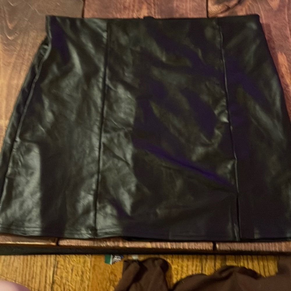 It’s a fake leather skirt